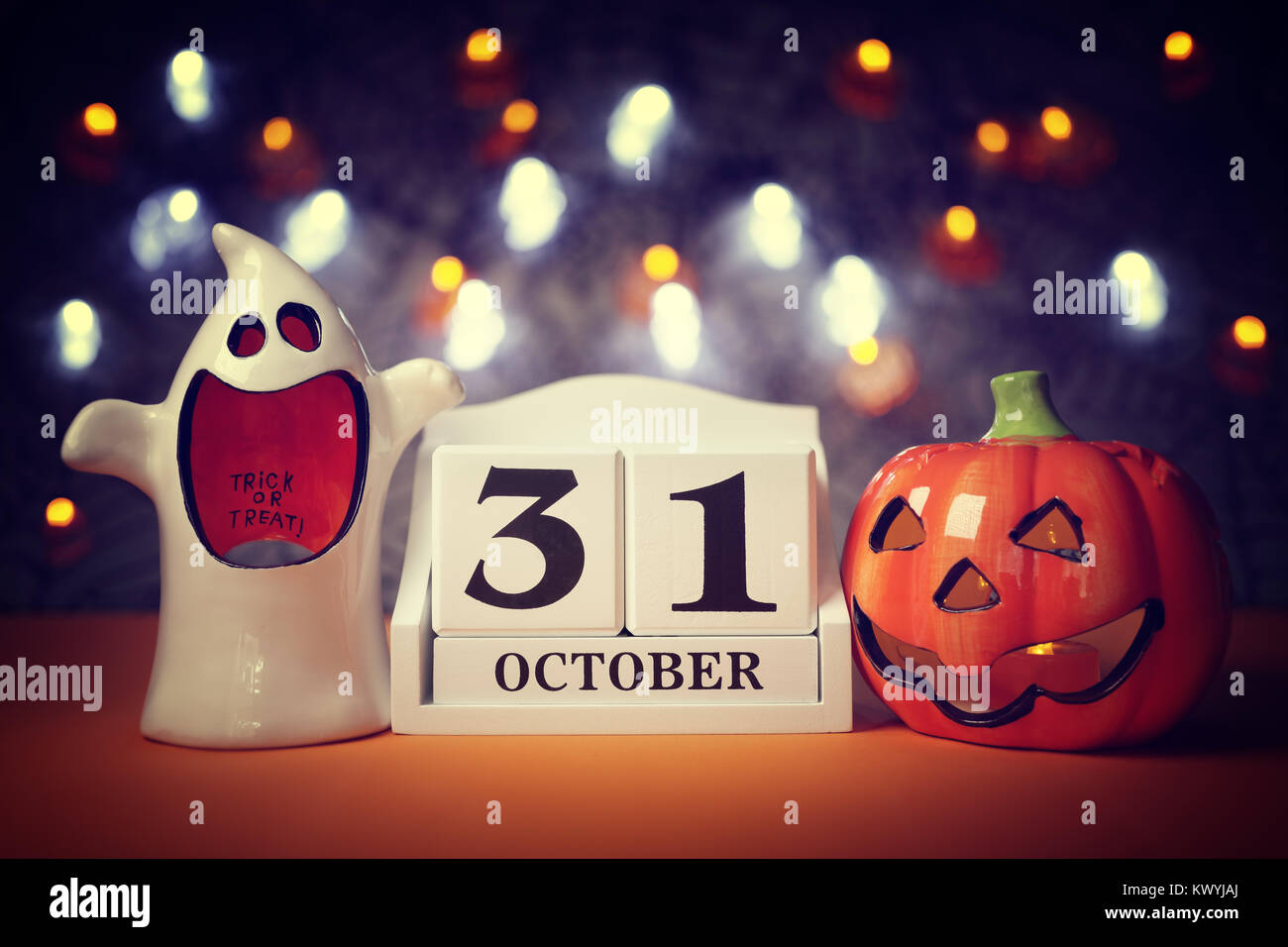 Halloween calendar date 31st October with pumpkin and ghost Stock Photo