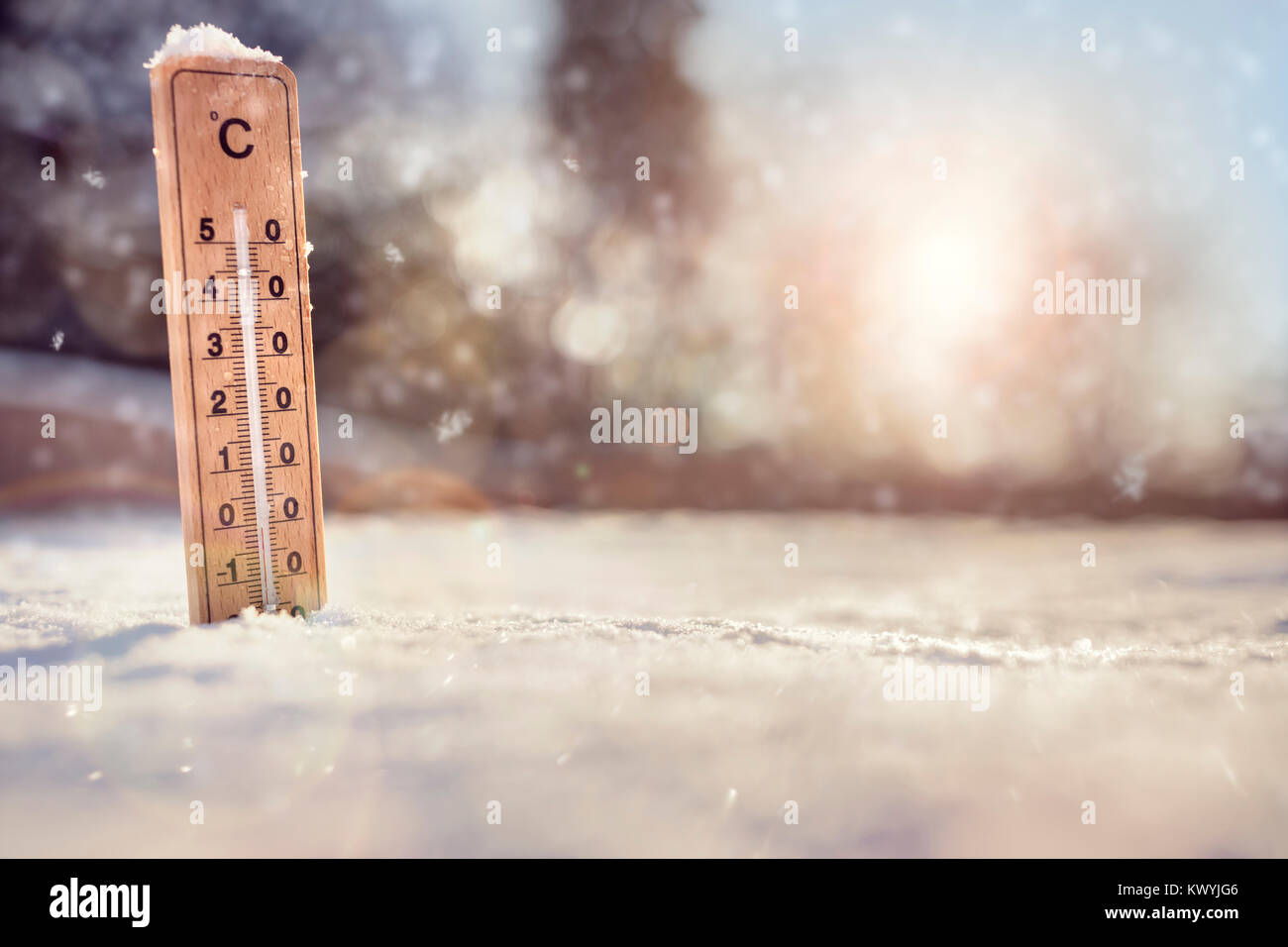 Thermometer in the snow with sub zero minus temperature concept for winter Stock Photo