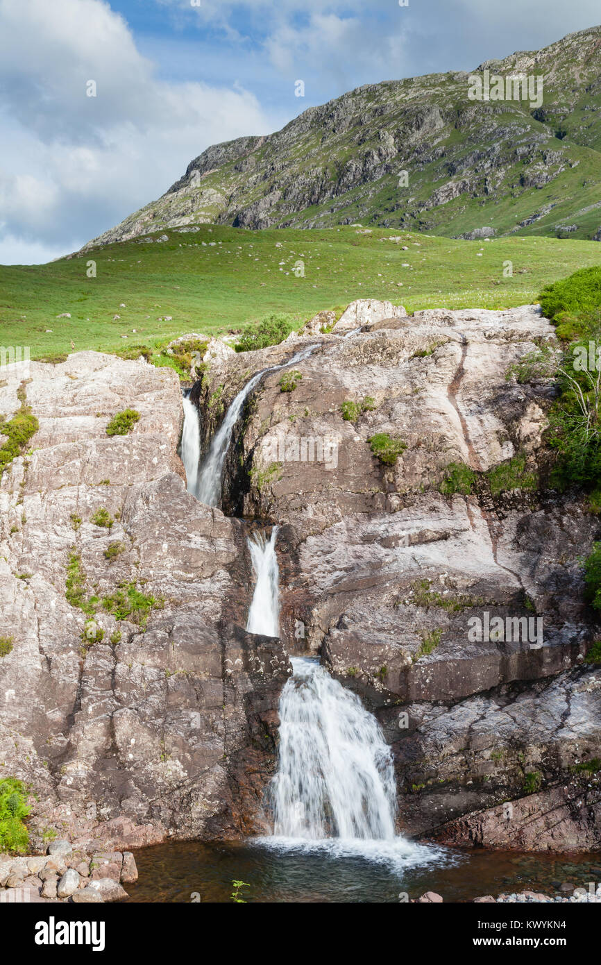 Glencoe Waterfall.  A waterfall in Glencoe in the Scottish highlands.  Glencoe is the most famous of all the Scottish glens. Stock Photo