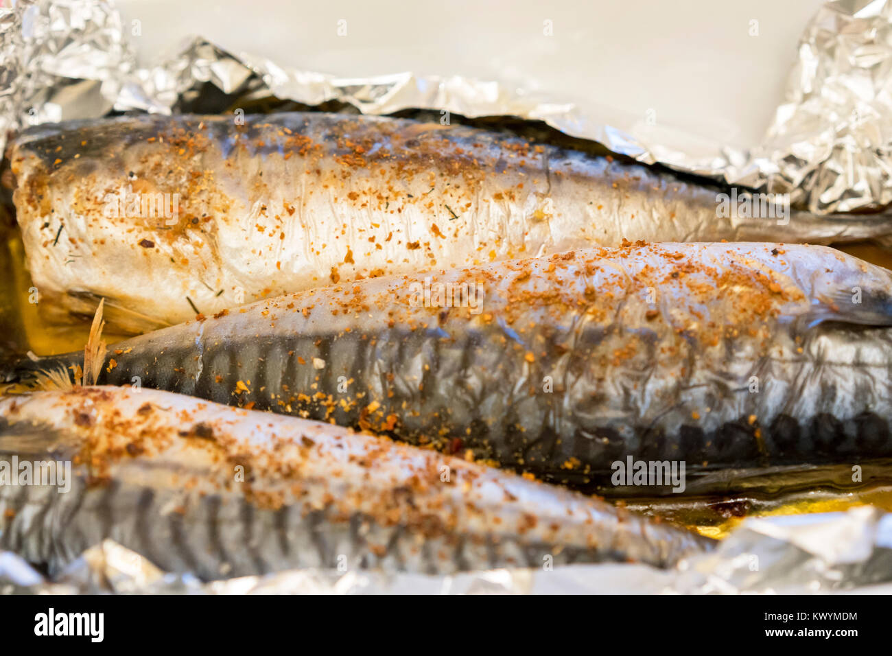 Three fish baked in foil. Mackerel Stock Photo Alamy