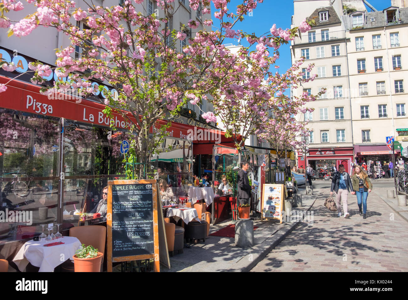 PARIS, FRANCE - APRIL 18 2016: A row of restaurants in Latin Quarter at Spring. Once a student neighbourhood, now the district is one of the most popu Stock Photo