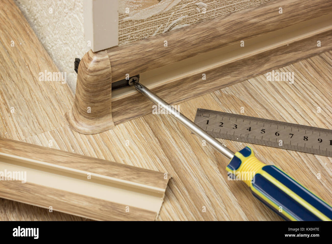 Plastic baseboard is installed on the corner of the room Stock Photo Alamy