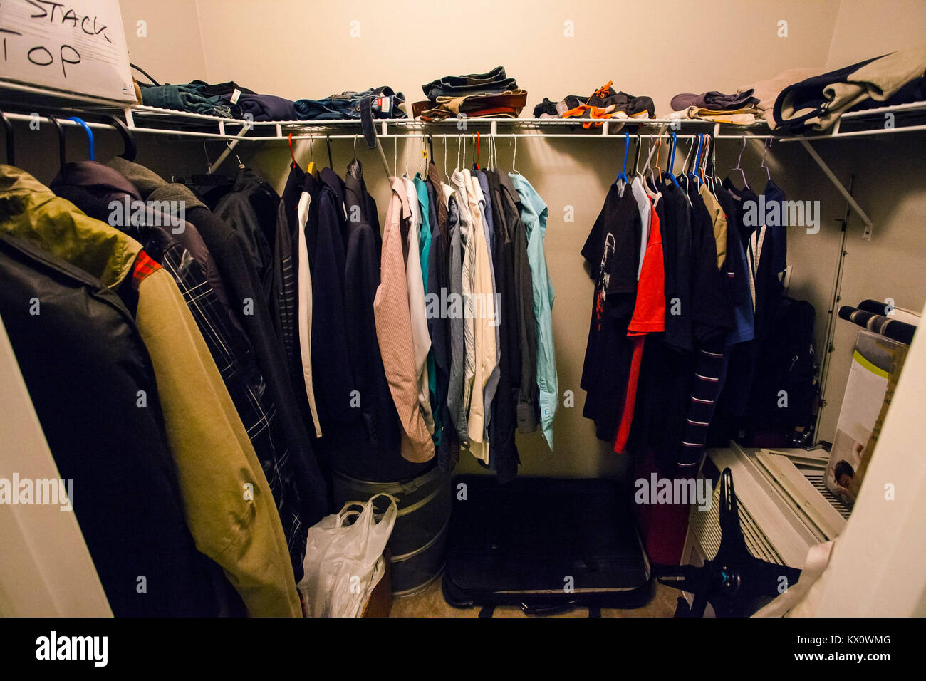 Closet Of A Man With Shirts And Suit Inside Stock Photo 170894544