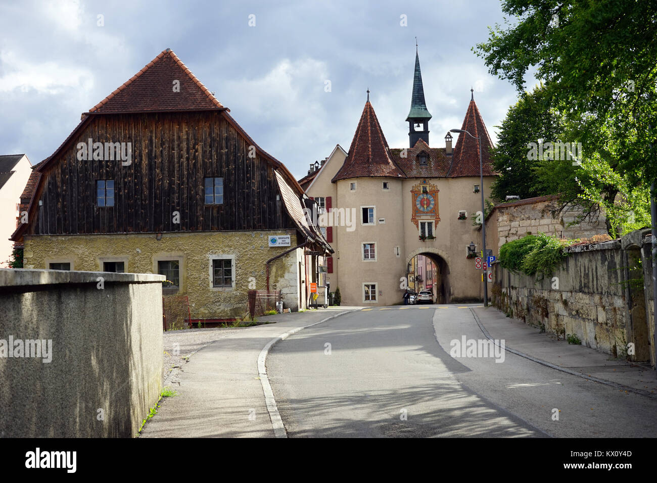 PORRENTRUY, SWITZERLAND – CIRCA JULY 2015 Street and French gate Stock Photo