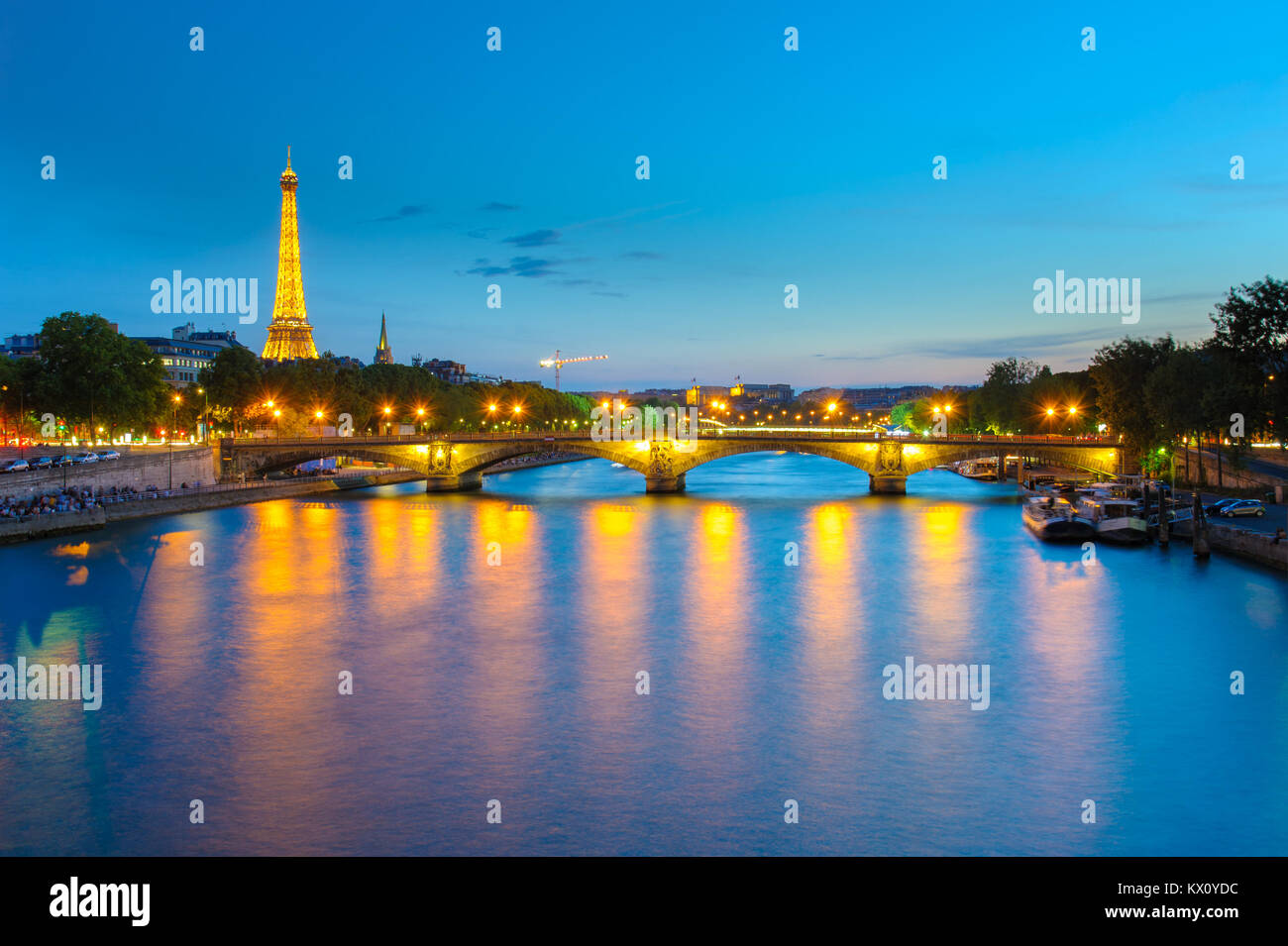 Night view of Eiffel Tower and Pont des invalides in Paris Stock Photo