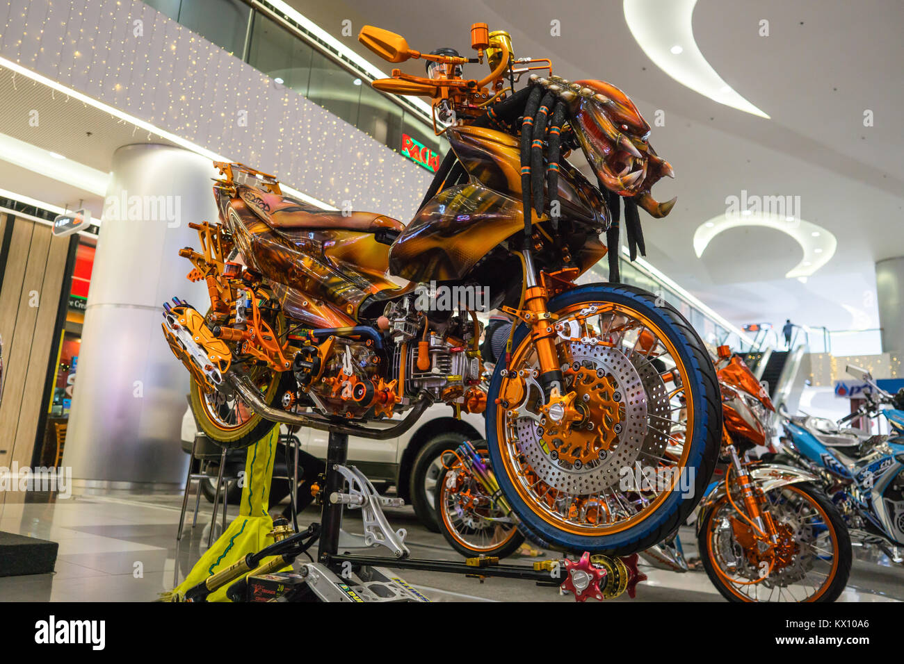 A 150 Raider motorcycle,popular in the Philippines,'blinged up' with the Predator movie theme. Stock Photo
