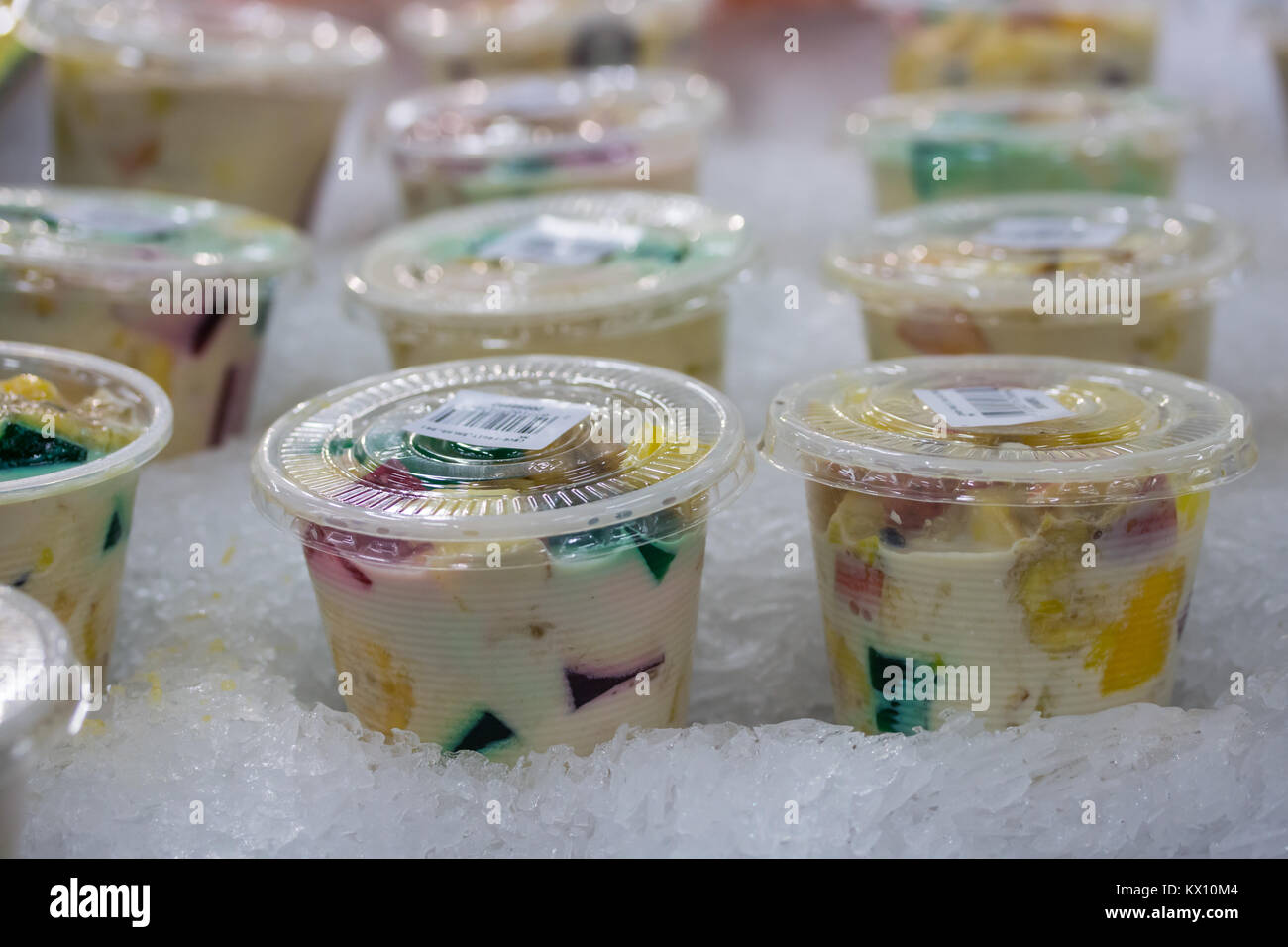 Halo Halo is a favourite Filipino dessert.A Concoction of ice shavings, evaporated milk, boiled sweetened kidney beans, sugar palm fruit, macapuno, la Stock Photo