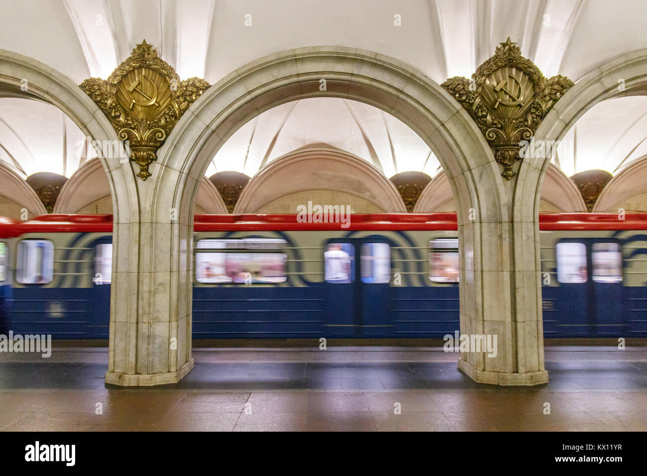 Platform of the Paveletskaya station, part of the Zamoskvoretskaya line, with leaving metro. Moscow, Russia. Stock Photo