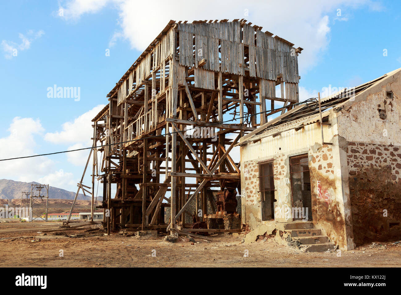 Remains of the salt mining engineering loading bays at Pedra de Lume, on the east coast of Sal Island, Salinas, Cape Verde, Africa. T Stock Photo
