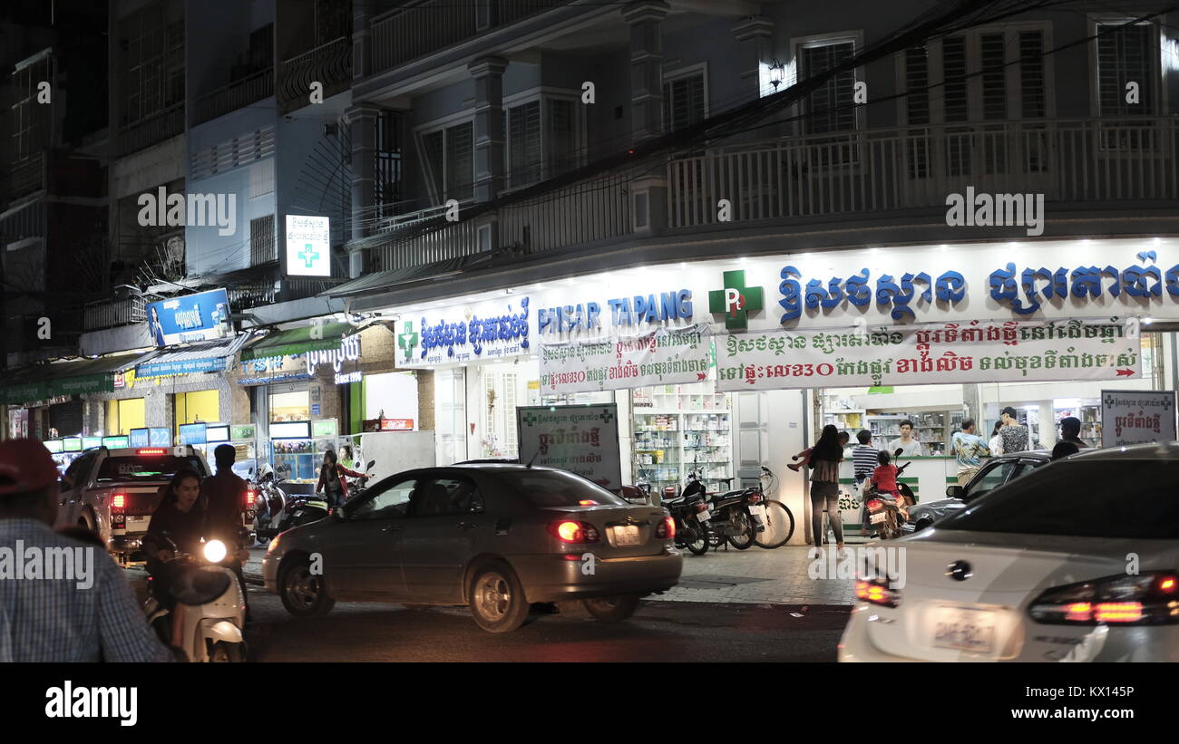 Medicine Pill Sellers on Rue Pharmacie or Pharmacy Row 136 Street and intersection of Pasteur Street 51 Phnom Penh Cambodia at Night Stock Photo