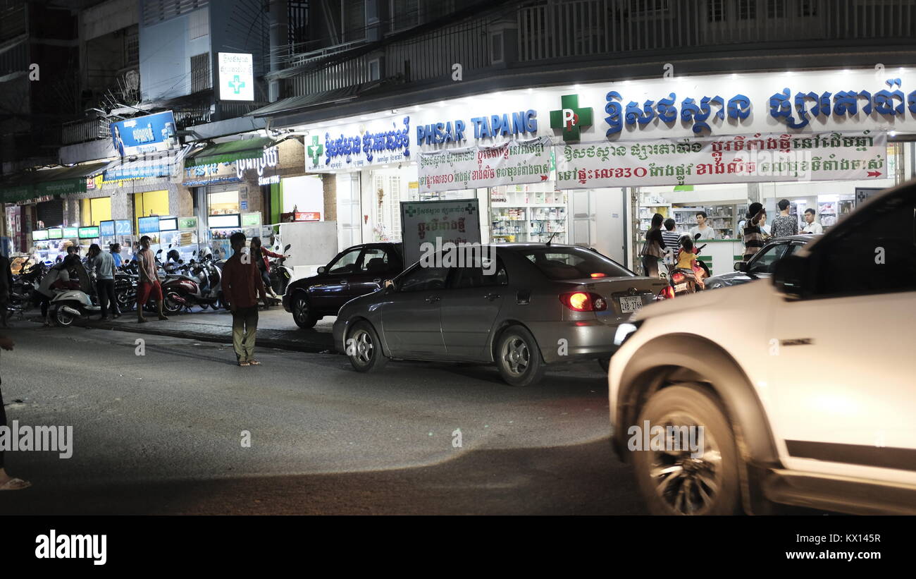 Medicine Pill Sellers on Rue Pharmacie or Pharmacy Row 136 Street and intersection of Pasteur Street 51 Phnom Penh Cambodia at Night Stock Photo