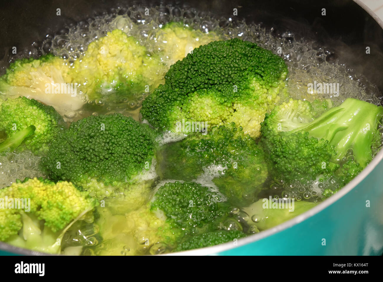 Broccoli Cooking In Hot Water On A Hob Stock Photo Alamy