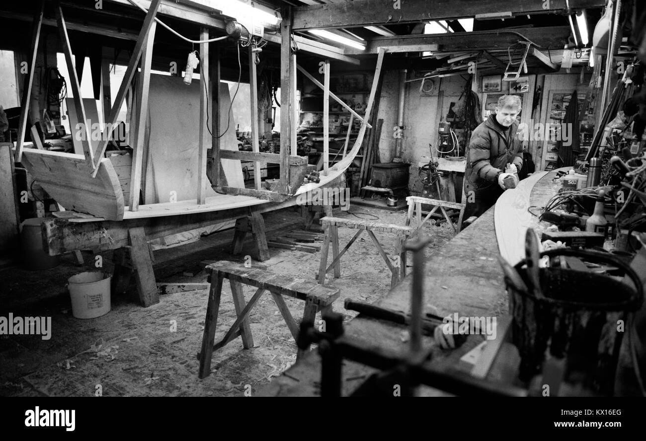 Ian Simpson the last builder of traditional Tweed boats at work on a boat Stock Photo