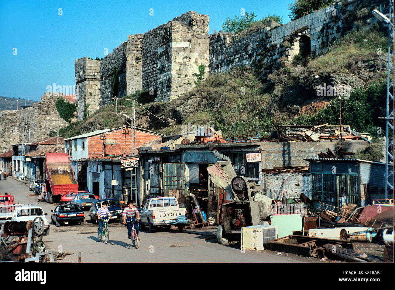 Old City Walls or Town Walls above Garages and Mechanics Workshops Sinop, ancient Sinope, Turkey Stock Photo