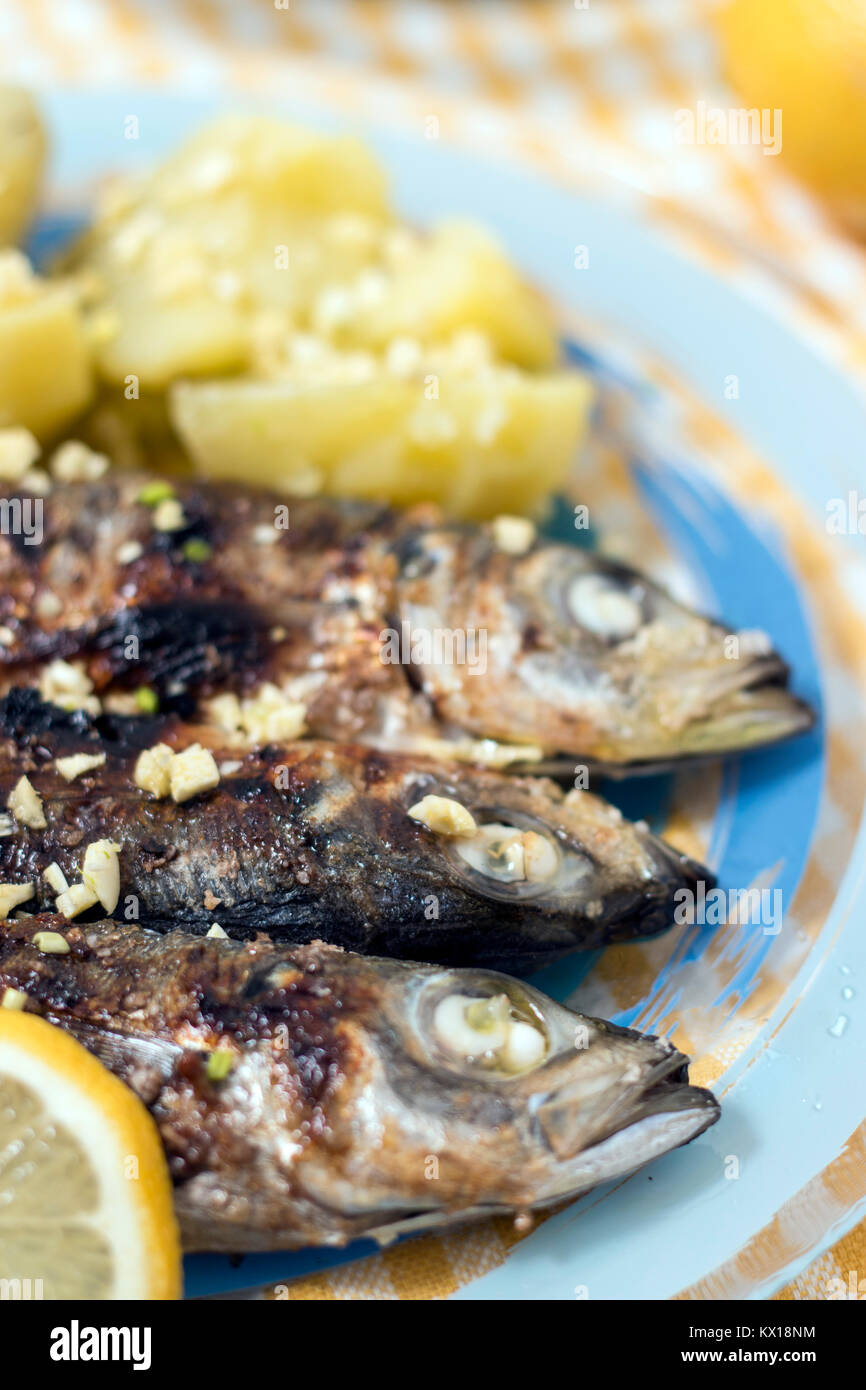 Grilled atlantic horse mackerel meal with potatoes Stock Photo Alamy