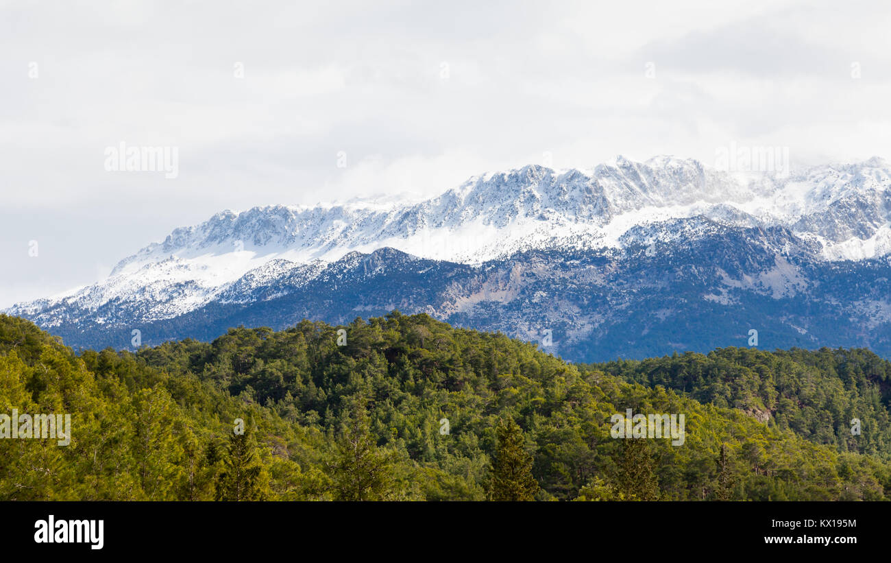 The view across Koprulu Canyon National Park, in south western Turkey, towards snow capped Taurus mountain tops. Stock Photo