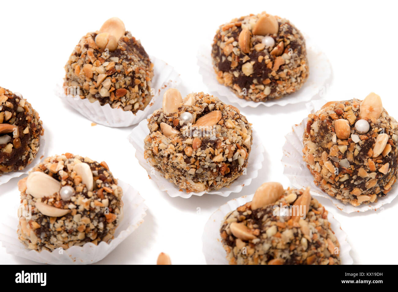 Traditional portuguese sweet of fig, carob and almond balls isolated on