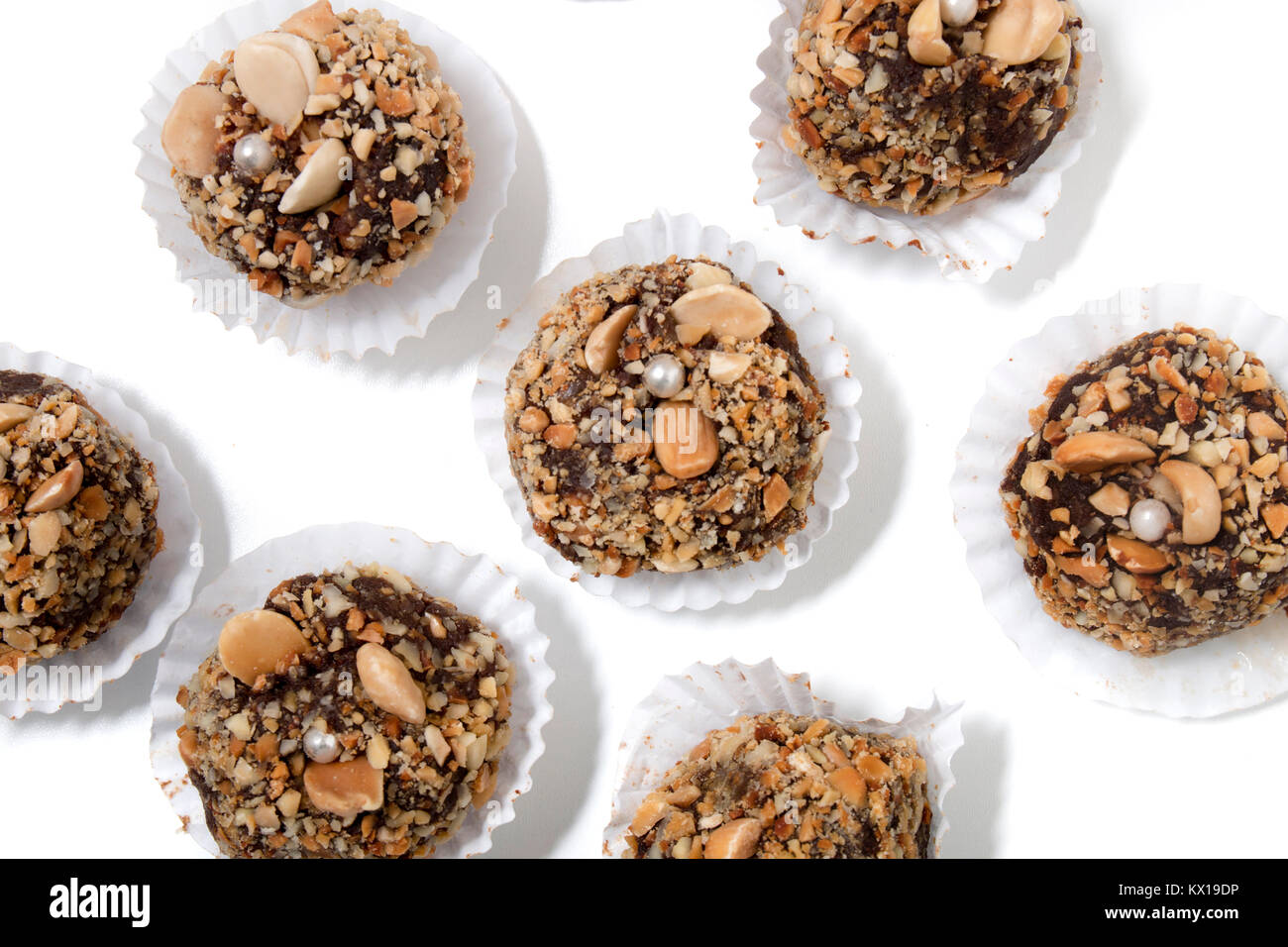 Traditional portuguese sweet of fig, carob and almond balls isolated on