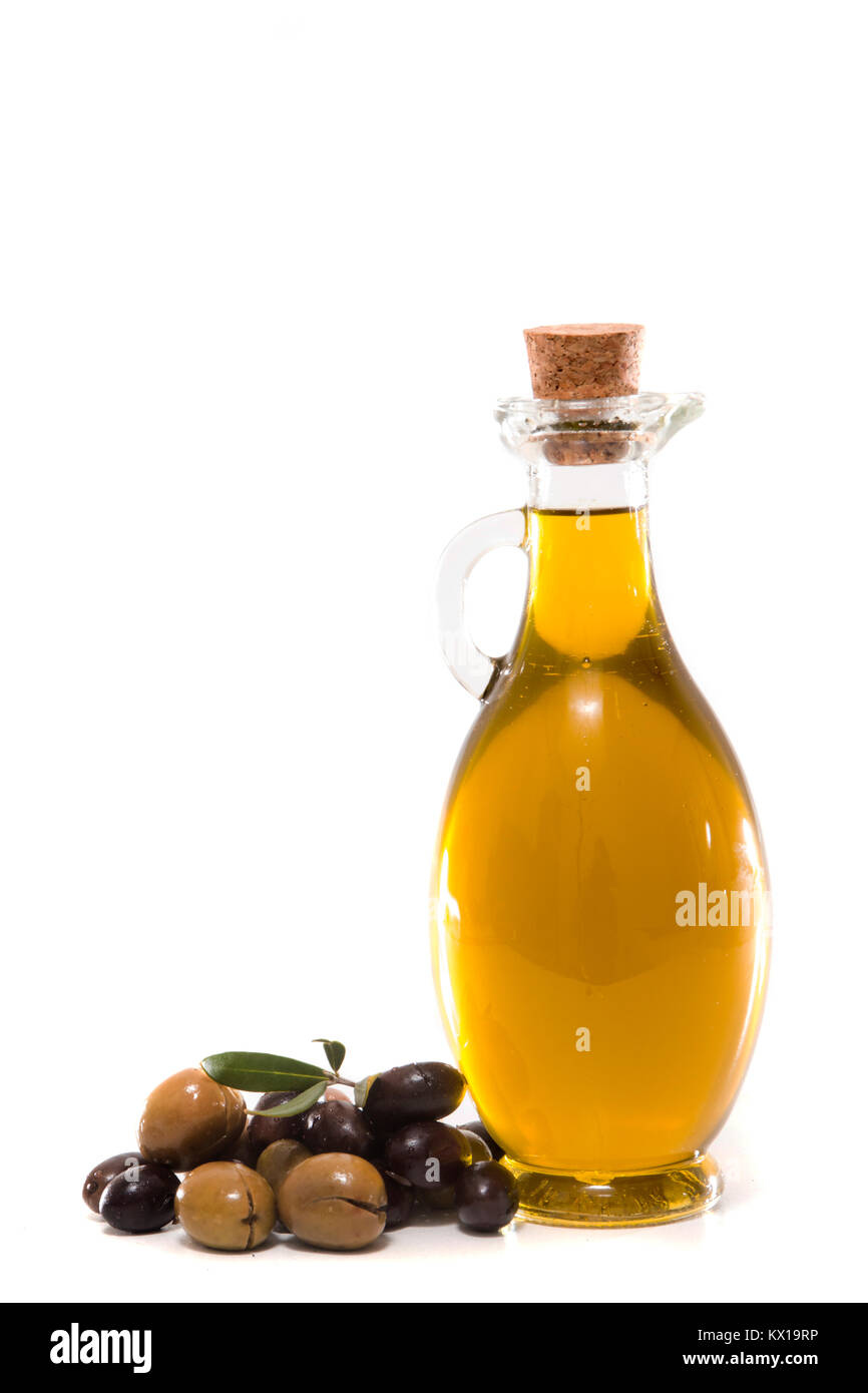 Green and black olives with olive oil bottle isolated on a white ...
