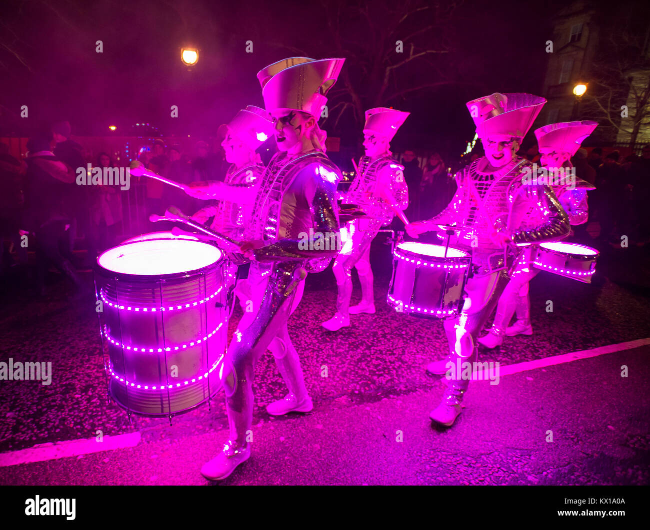 Spark LED Drummers entertain crowds on the Mound as part of the Edinburgh Hogmanay Celebrations 2017/18. Stock Photo