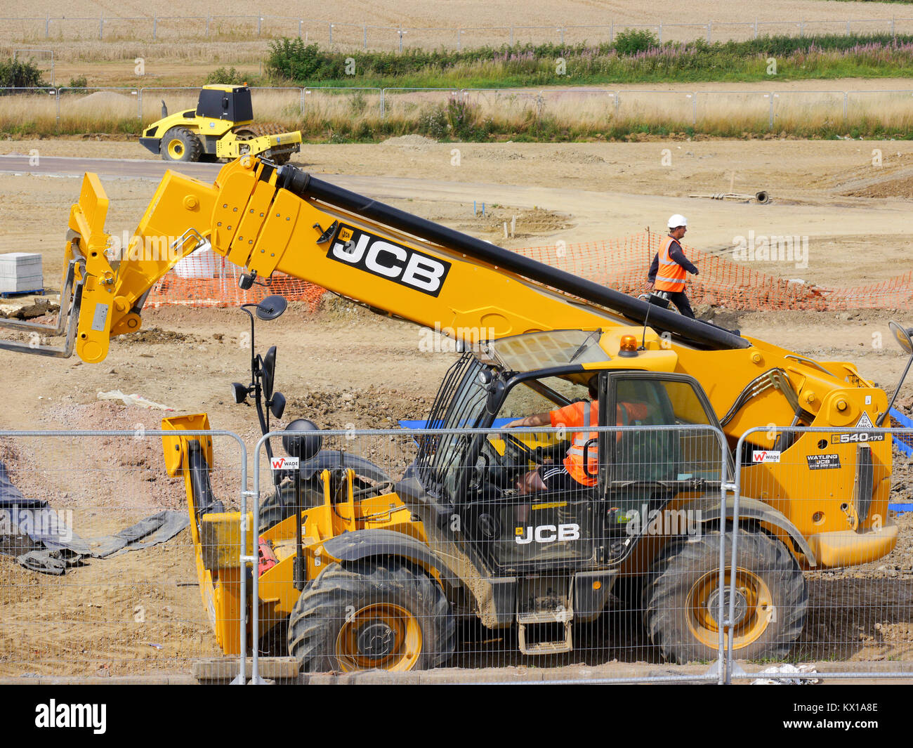 Heavy machinery being used during housing development, Grantham, Lincolnshire, England, U.K. Stock Photo