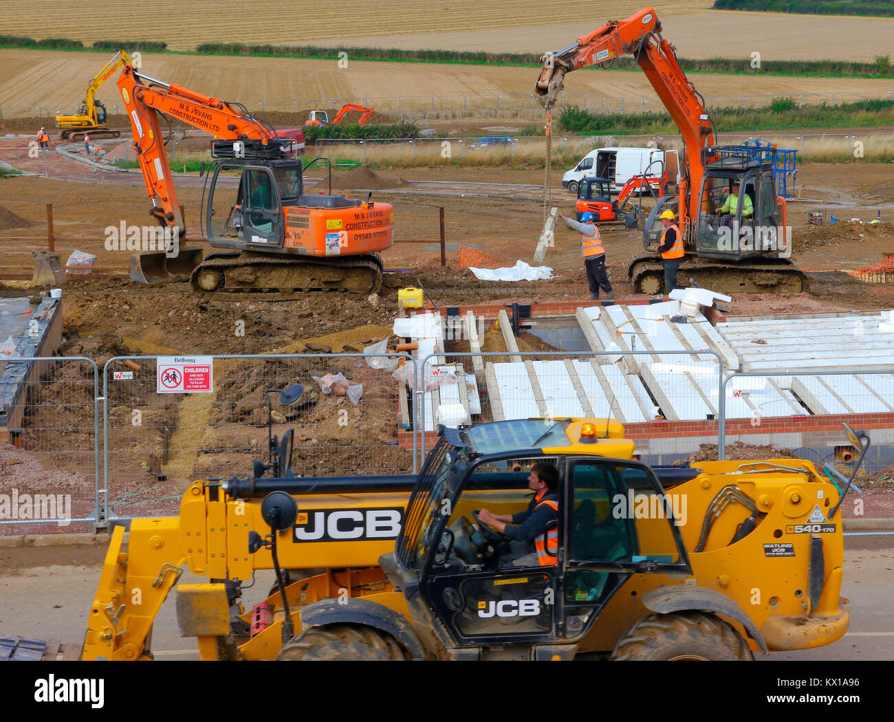 Heavy machinery being used during housing development, Grantham, Lincolnshire, England, U.K. Stock Photo