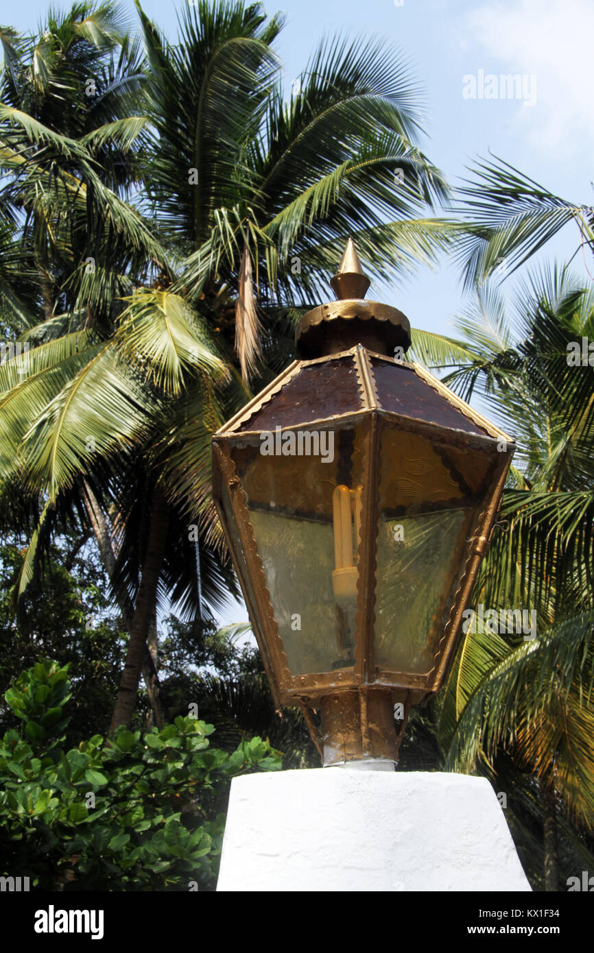 Color glass lamp on the wall of staircase in Sapugoda temple in