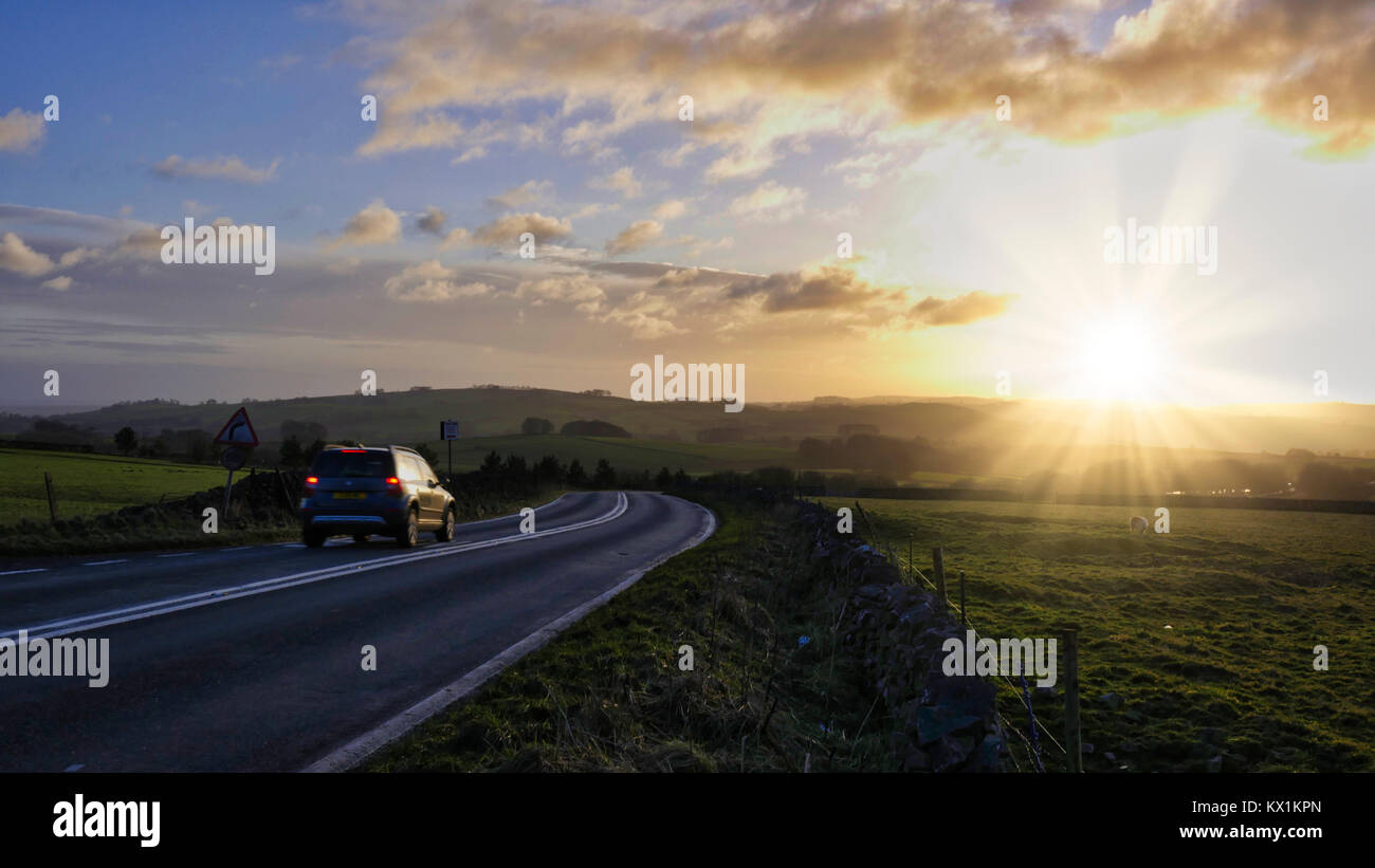 Peak District National Park, Derbyshire. 6th January, 2018. UK Weather: spectacular sunset along the A515 road between Buxton & Ashbourne in the Peak District National Park, Derbyshire Credit: Doug Blane/Alamy Live News Stock Photo
