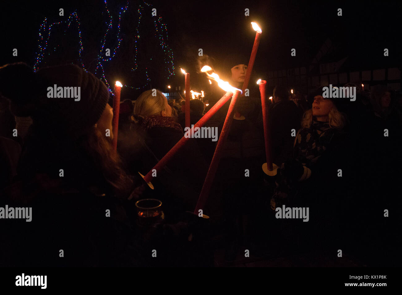 LEOMINSTER - JANUARY 06: Members of the Leominster Morris gather with crowds outside the Crown Inn before heading to the nearby apple orchard to take part in a torchlit  Cider wassailing ceremony ahead of Twelfth Night in Dilwyn, Herefordshire, England, on January 6th 2018. Credit: Jim Wood/Alamy Live News Stock Photo