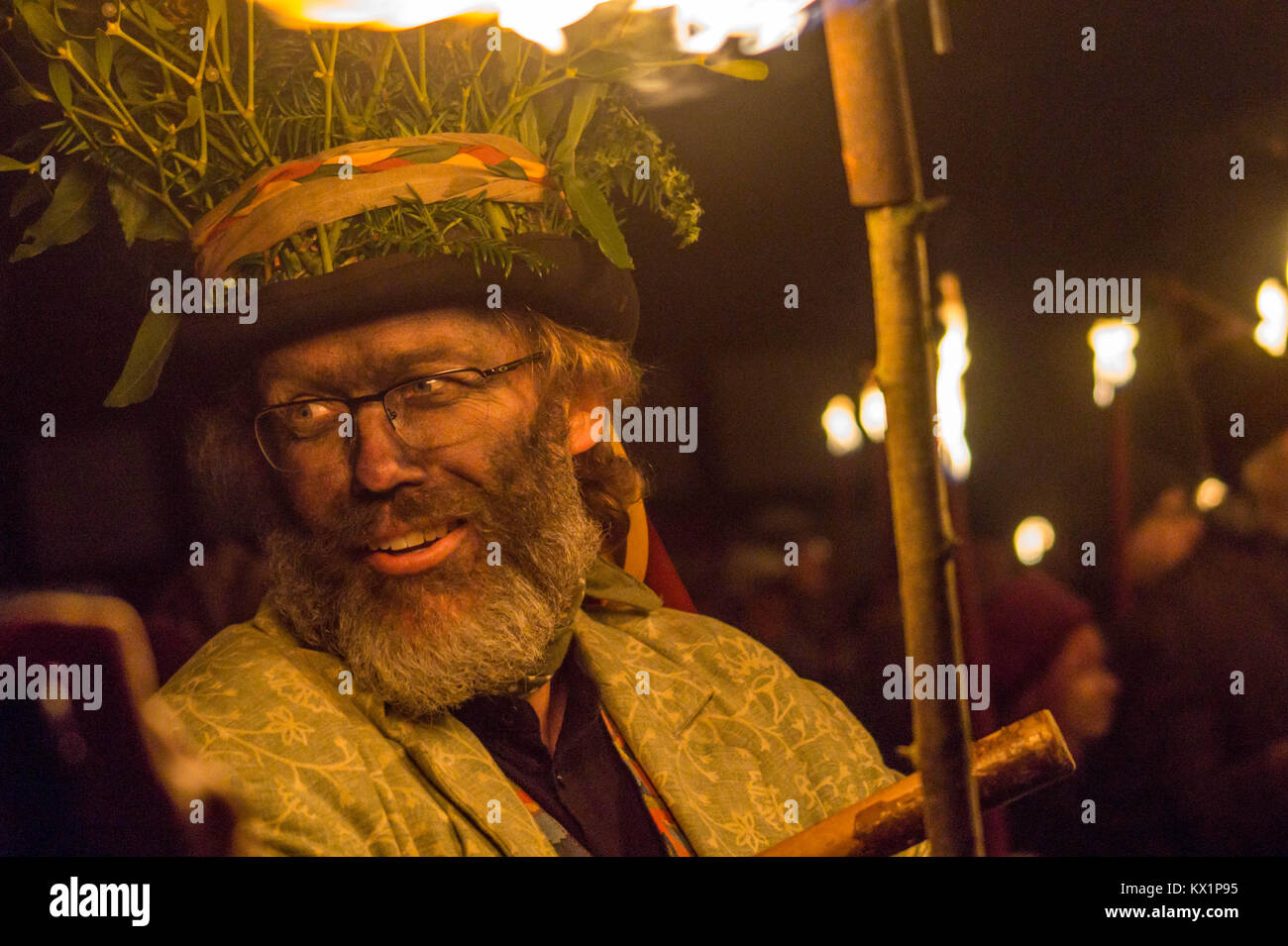 LEOMINSTER - JANUARY 06: Members of the Leominster Morris gather with crowds outside the Crown Inn before heading to the nearby apple orchard to take part in a torchlit  Cider wassailing ceremony ahead of Twelfth Night in Dilwyn, Herefordshire, England, on January 6th 2018. Credit: Jim Wood/Alamy Live News Stock Photo