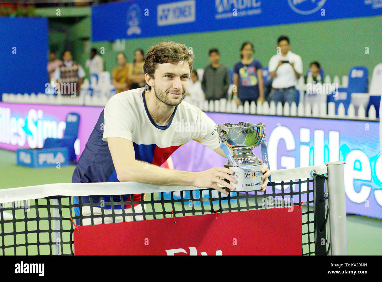 Pune, India. 6th January 2018. Gilles Simon of France with the singles trophy after winning the finals at the Tata Open Maharashtra tournament at Mahalunge Balewadi Tennis Stadium in Pune, India. Credit: Karunesh Johri/Alamy Live News. Stock Photo
