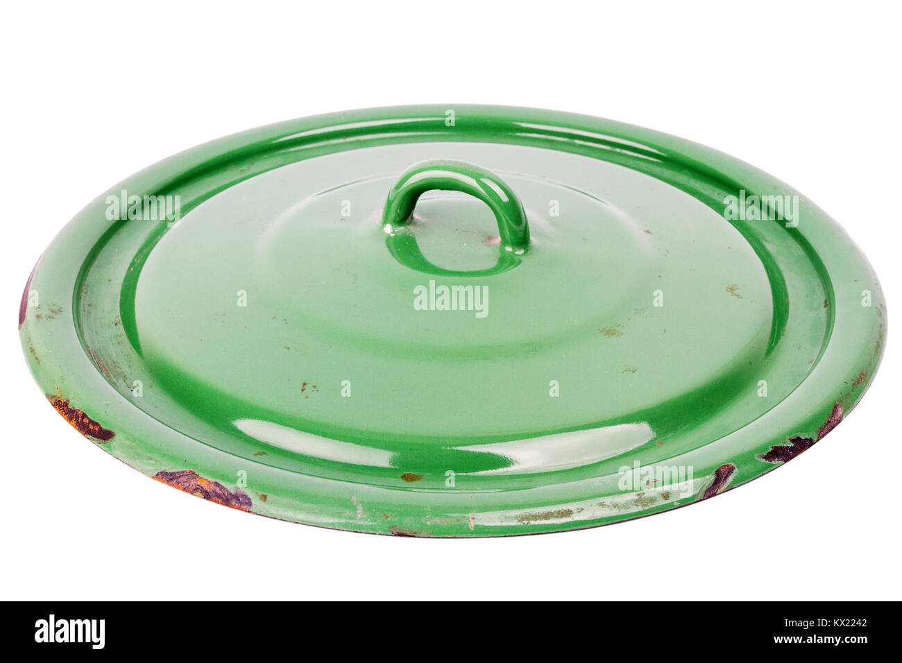 Old grungy green cooking pot lid isolated on white background Stock