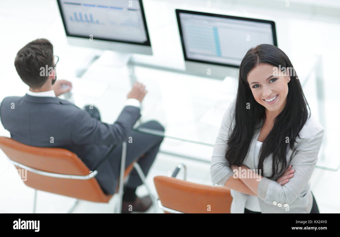 successful business woman on the background of a modern workplace ...