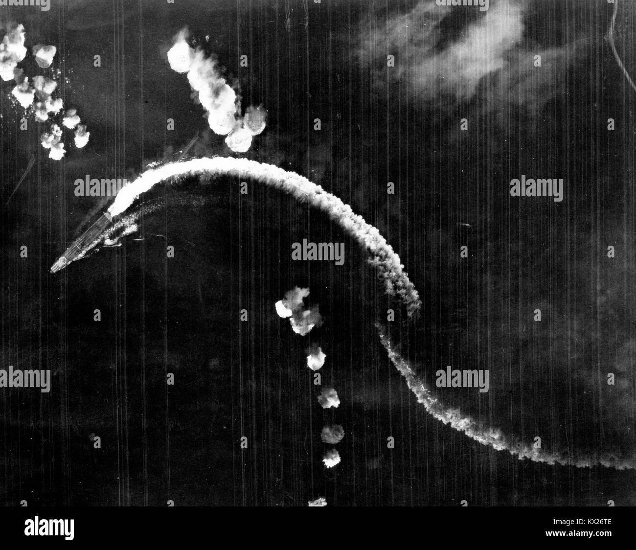 Japanese aircraft carrier Hiryu maneuvering during a high-level bombing attack by USAAF B-17 bombers, shortly after 8AM, 4 June 1942 during Battle of Midway Stock Photo