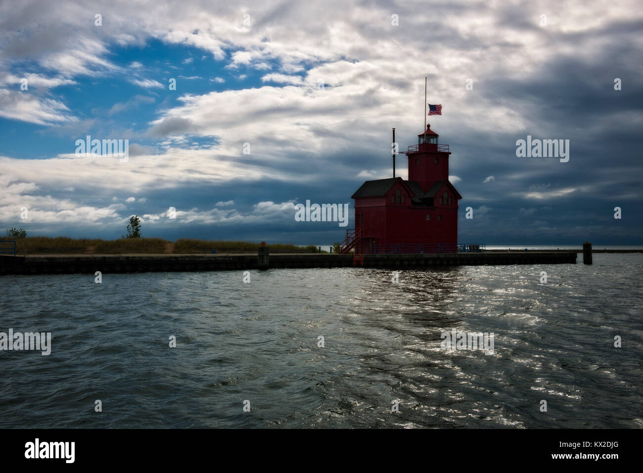 An autumn storm builds over Michigan’s Holland Harbor Lighthouse