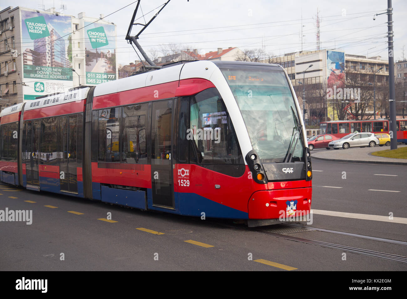 New red CAF Urbos 3 tram on Slavija square in Belgrade, Serbia Stock Photo