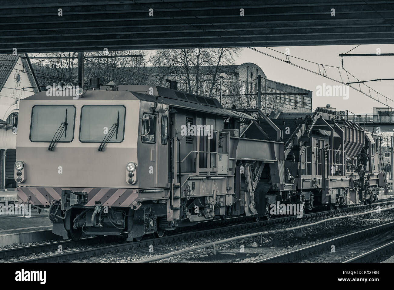 Ballast distributing and profiling track machine. Repair train Stock