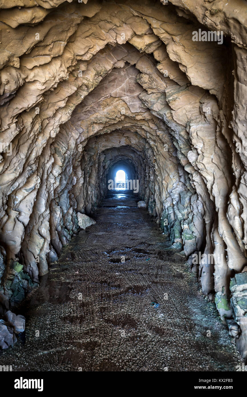 rock tunnel at São Martinho do Porto, Portugal. Leading from the
