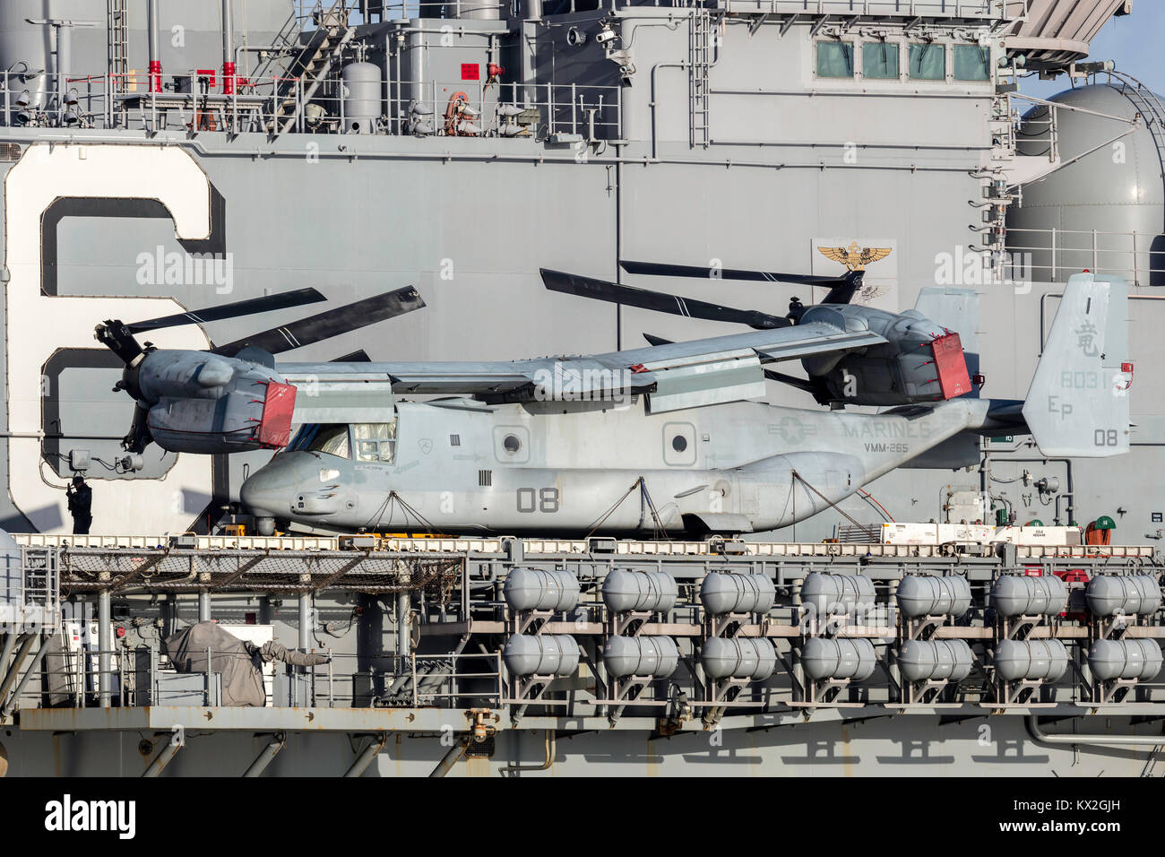 Bell Boeing MV-22 Osprey tilt rotor aircraft from the United States Marine Corps on the deck of Untied States Stock Photo