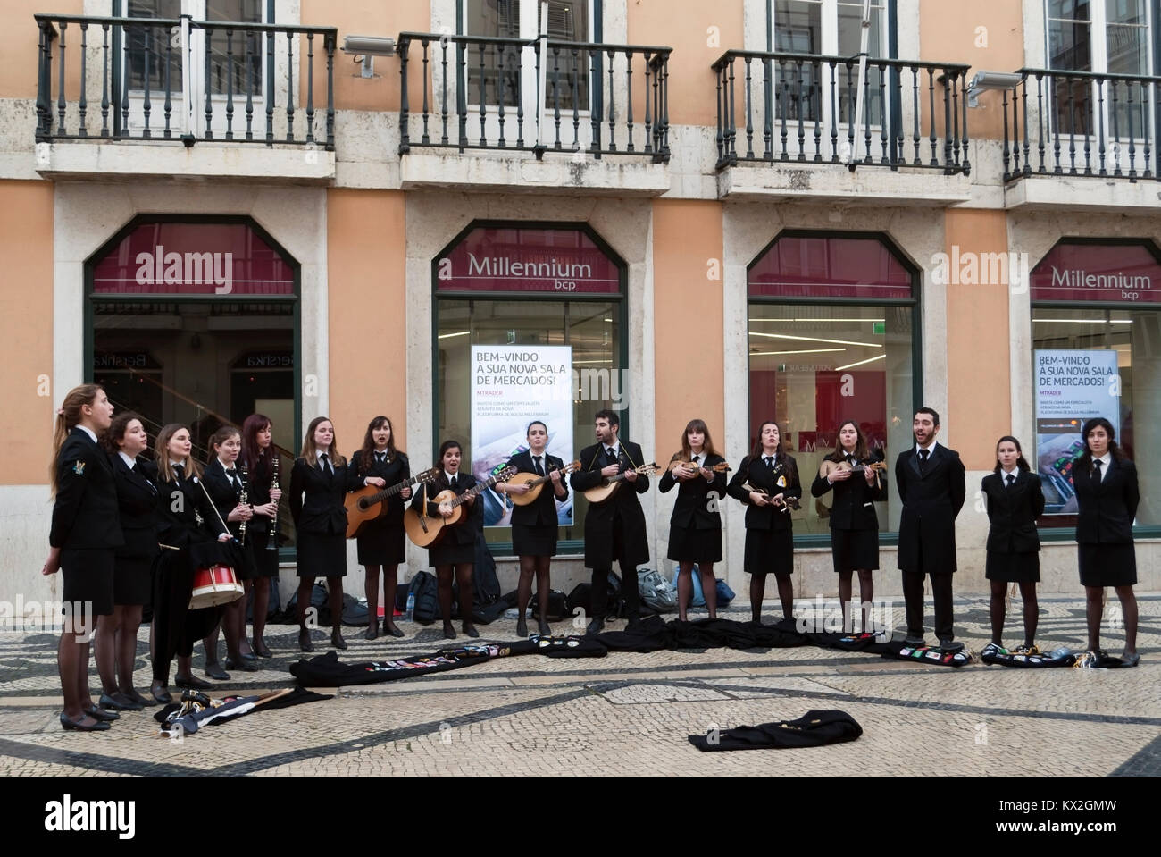 University students singing and playing in the street, Lisbon, Portugal Stock Photo