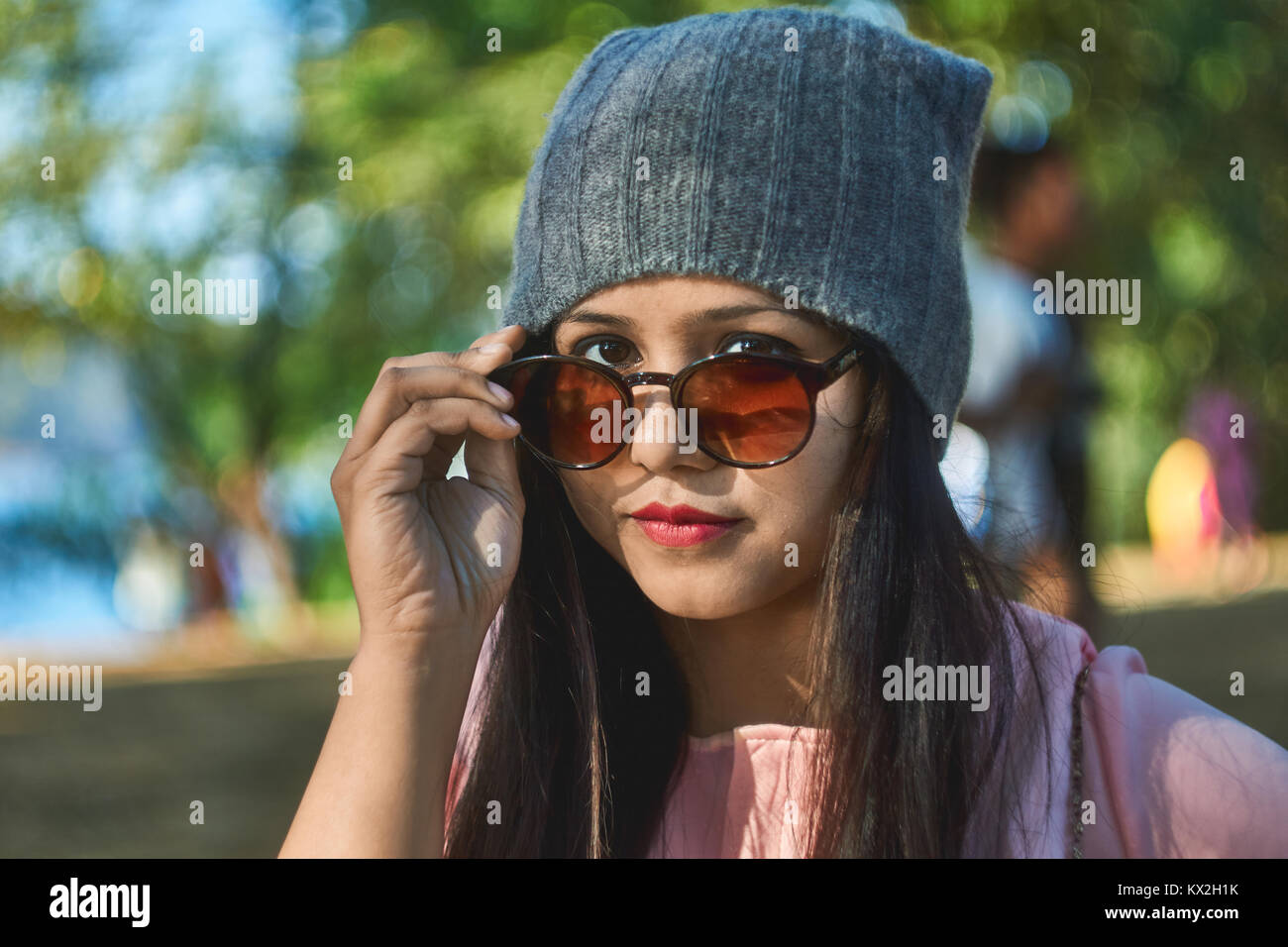 Close up of girl wearing sunglasses. Stock Photo