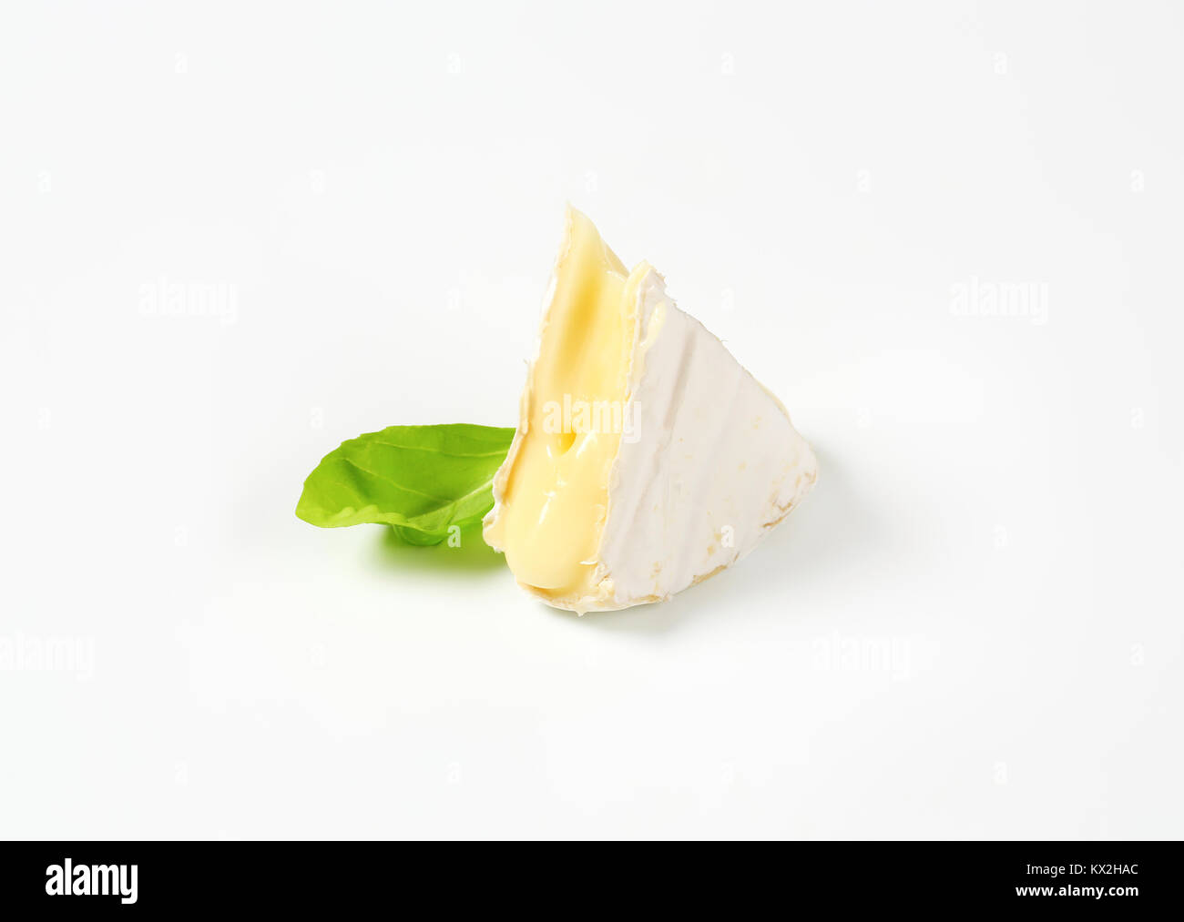 Soft Rind Ripened Cheese piece of soft-ripened cheese with white rind Stock Photo - Alamy