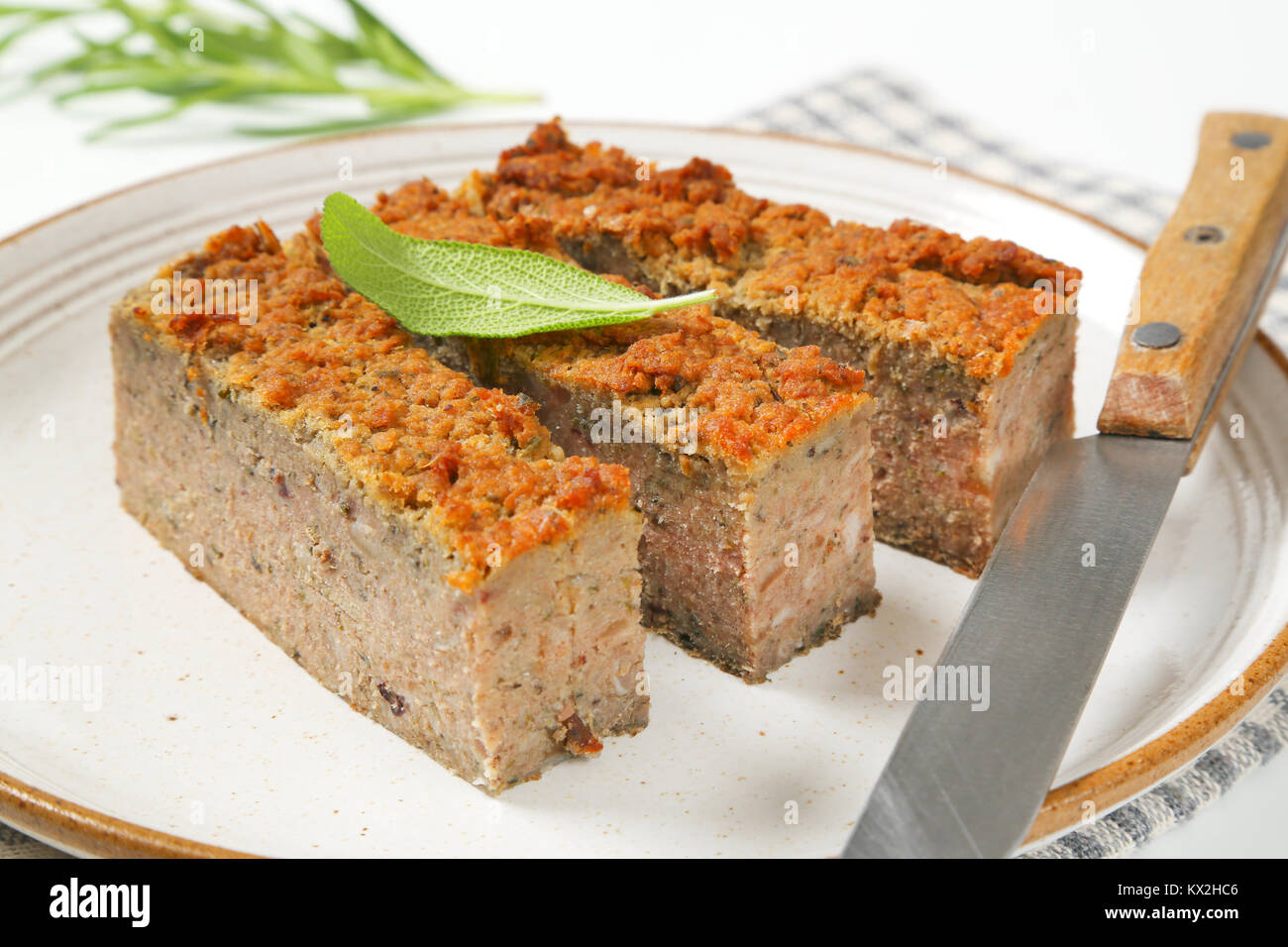 slices of ovenbaked pork and liver meatloaf on plate Stock Photo Alamy