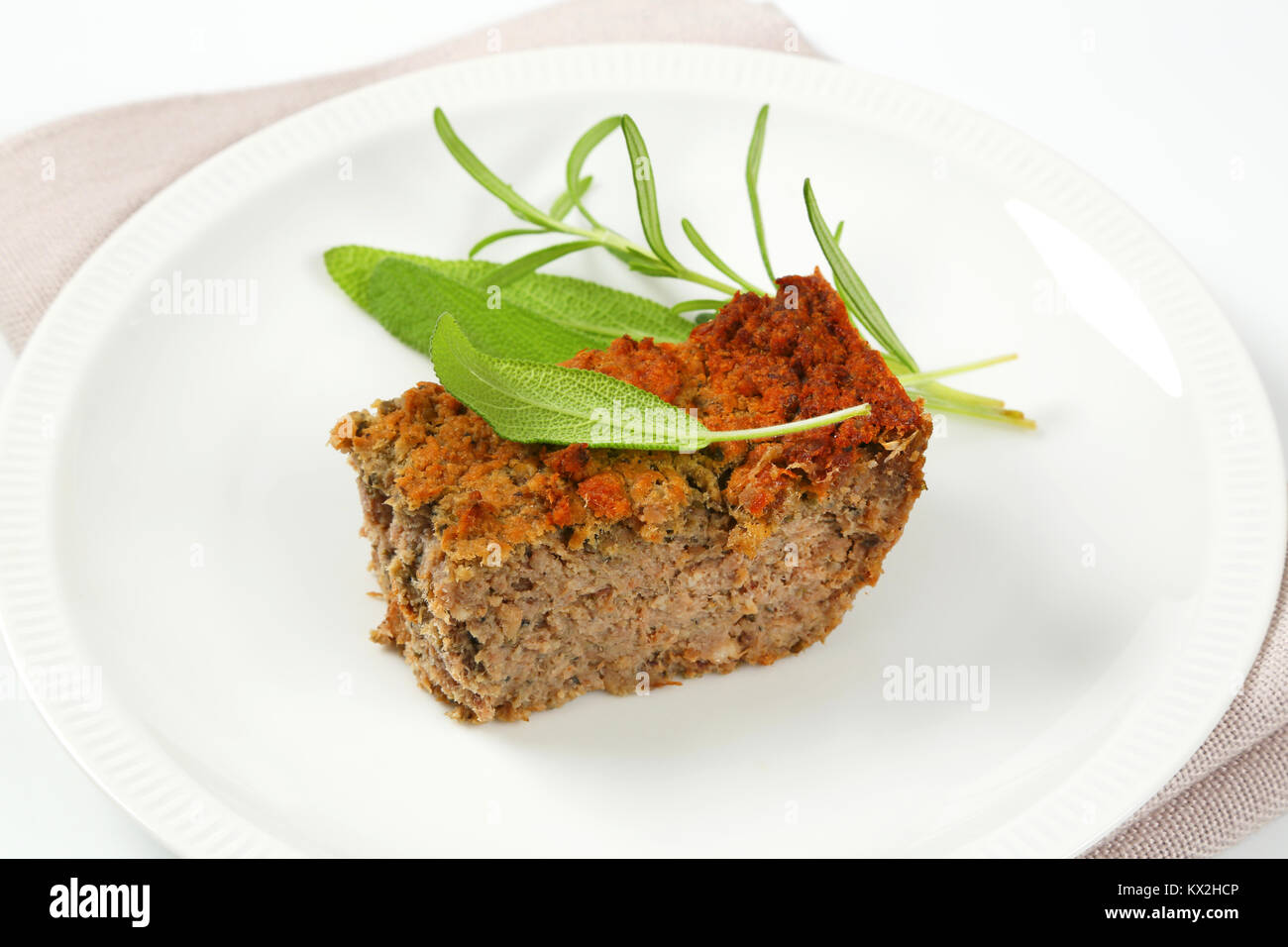 piece of ovenbaked pork and liver meatloaf Stock Photo Alamy
