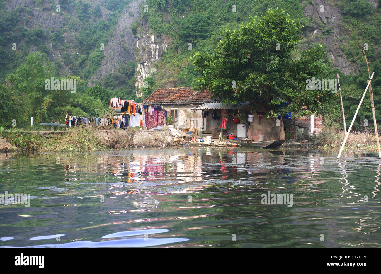 House in the tam Coc river, Vietnam Stock Photo