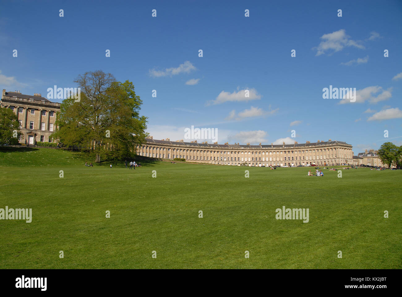 People relaxing on the lawn in front of The Royal Crescent, Bath, United Kingdom Stock Photo