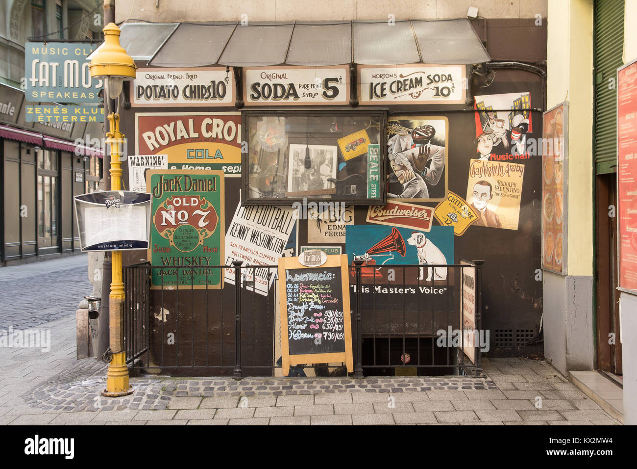 Budapest, Hungary - March 2014: vintage posters on entrance to Fat Mo's music club in Budapest, Hungary Stock Photo