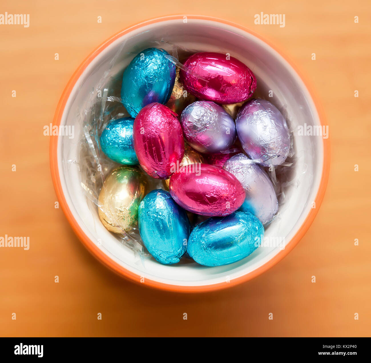 Colored chocolate eggs inside a cup Stock Photo