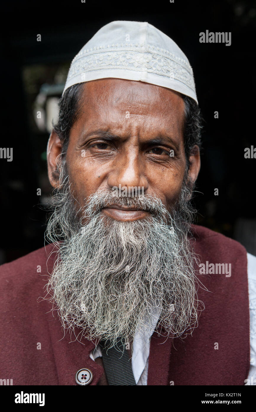 A portrait of a muslim man wearing a taqiyah in Lucknow, India Stock Photo