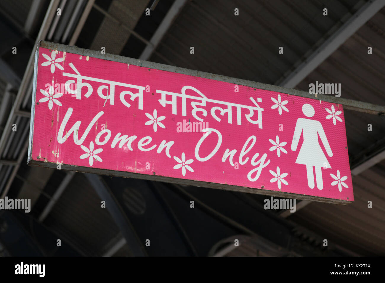 A women only sign (for carriages that are for women) at a metro station in New Delhi, India Stock Photo